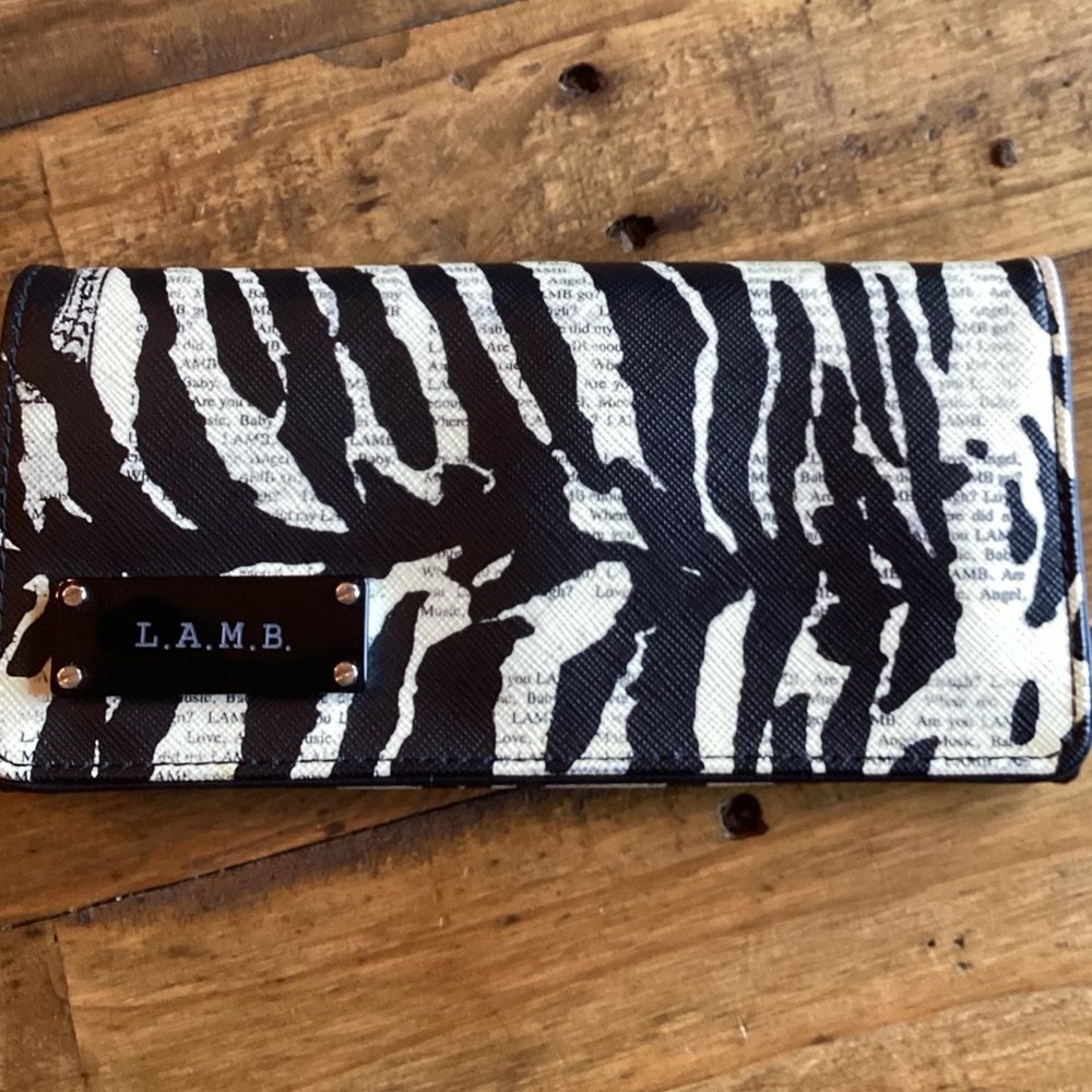 L.A.M.B wallet by Gwen Stefani.